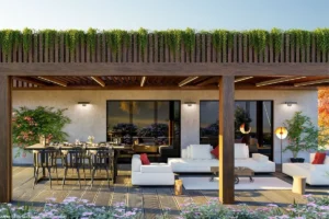 Privater Außenbereich neben dem Haus, gemütlich gestaltet als Rückzugsorte für entspannte Stunden im Freien.